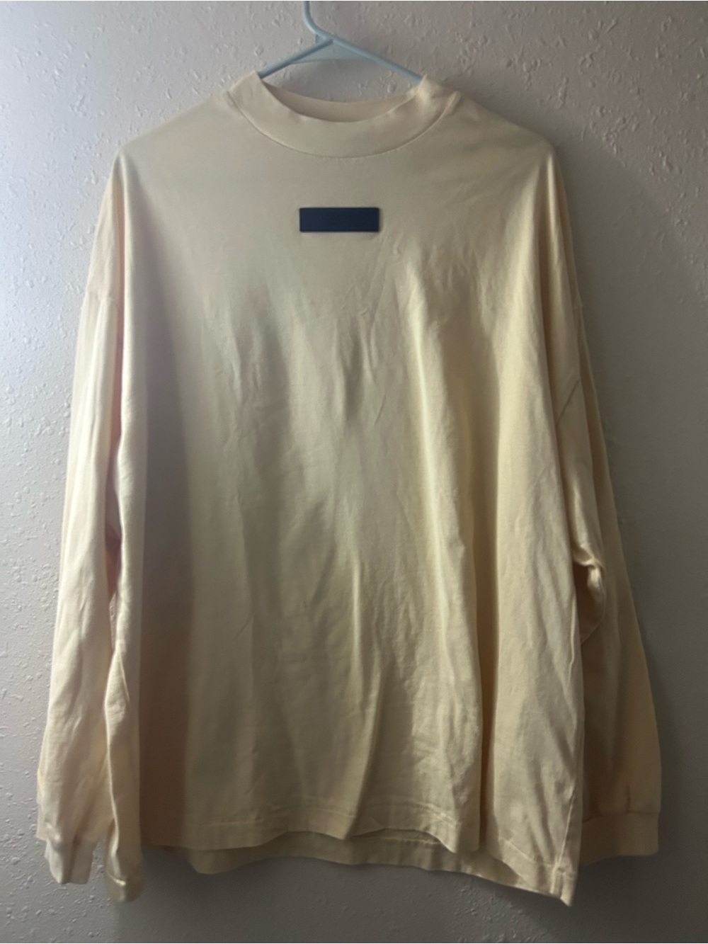 Essentials Long Sleeve Crewneck Shirt in Cream